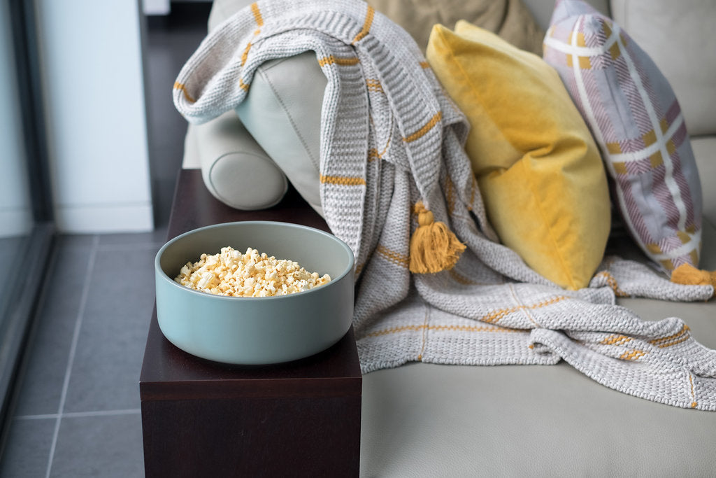 Make Your Couch Sing with the right Cushions and Throws.